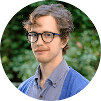 Headshot of Joel McGuire, Lead Researcher at the Happier Lives Institute