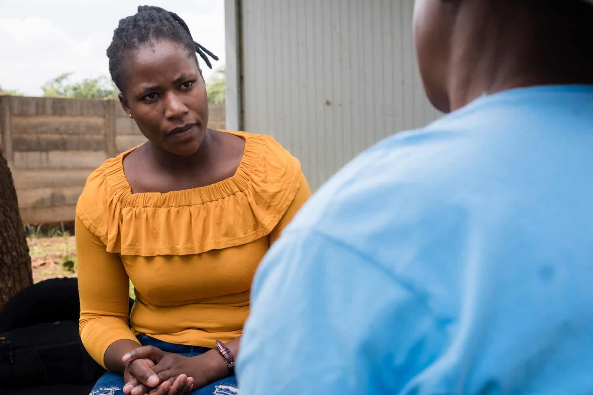 An intense conversation between a client and a peer counsellor on a Friendship
Bench in Zimbabwe.