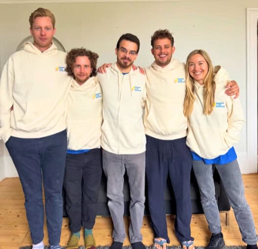 Five team members of the Happier Lives Institute portrayed together: Dr Michael Plant, Joel McGuire, Samuel Dupret, Ben Stewart and Alexandra Shearn