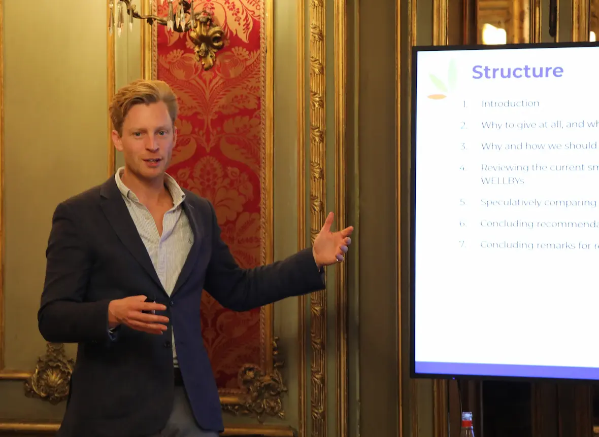 Head of research Michael Plant at a conference about wellbeing