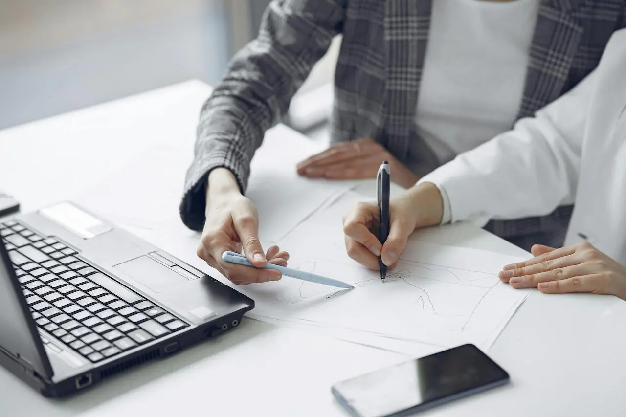 Consultants reviewing research findings at Happier Lives Institute